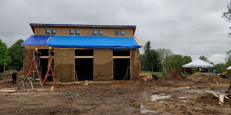 A picture of the straw bale structure at the sight of the Campus Farm at the University of Michigan in Ann Arbor